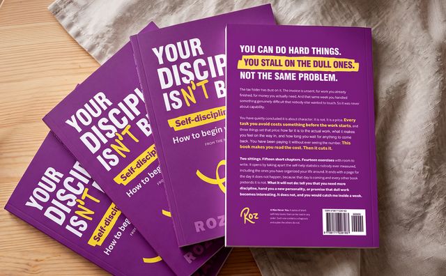 A fanned stack of the paperback, front and back covers showing.